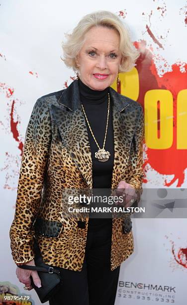 Actress Tippi Hedren poses on the red carpet as she arrives for the premiere of the documentary "The Road to Freedom" at the Egyptian Theater in...