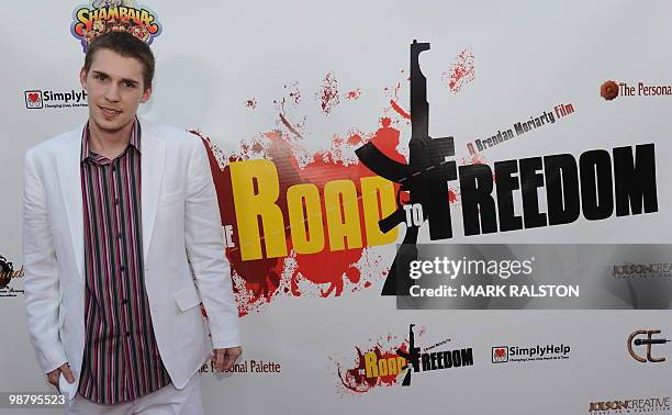 Director Brendan Moriarty poses on the red carpet as he arrives for the premiere of his documentary "The Road to Freedom" at the Egyptian Theater in...