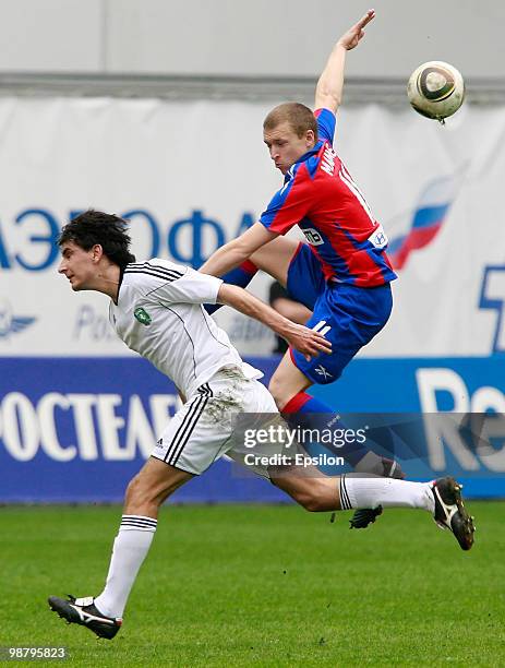Khimki russia pavel mamaev of pfc cska moscow battles for the ball with sergey kovalchuk of fc Khimki russia pavel mamaev of pfc cska moscow battles for the ball with sergey kovalchuk of fc