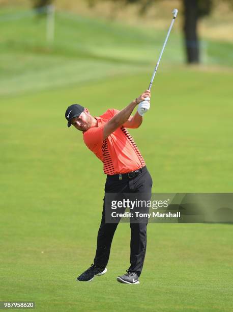 Jordan Smith of England plays his second shot on the 14th fairway during Day Three of the HNA Open de France at Le Golf National on June 30, 2018 in...