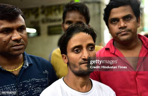 Gopal Dubey, brother of Deceased Govind dubey at Rajawadi Hospital Ghatkopar, on June 29, 2018 in Mumbai, India. Five people are reported to be dead,...