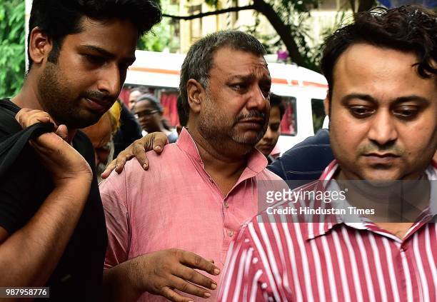 Father of deceased Manish Pandey at Rajawadi Hospital Ghatkopar, on June 29, 2018 in Mumbai, India. Five people are reported to be dead, including...