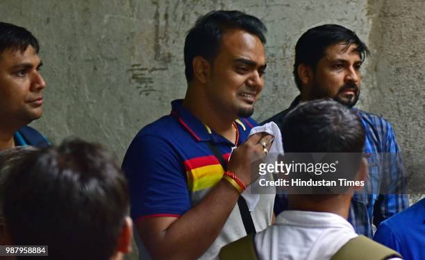 Relatives of Deceased Surabhi Gupta at Rajawadi Hospital Ghatkopar, on June 29, 2018 in Mumbai, India. Five people are reported to be dead, including...