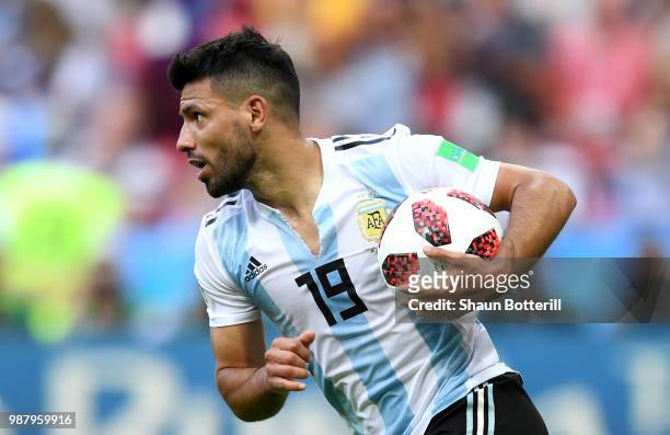 Serigo Aguero of Argentina celebrates after scoring his team's third goal during the 2018 FIFA World Cup Russia Round of 16 match between France and...
