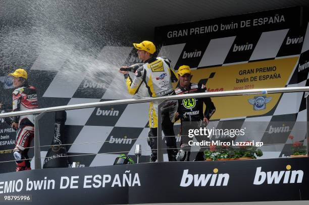 Shoya Tomizawa of Japan and Technomag - CIP and Thomas Luthi of Switzerland and Interwetten Moriwaki Racing and Toni Elias of Spain and Gresini...