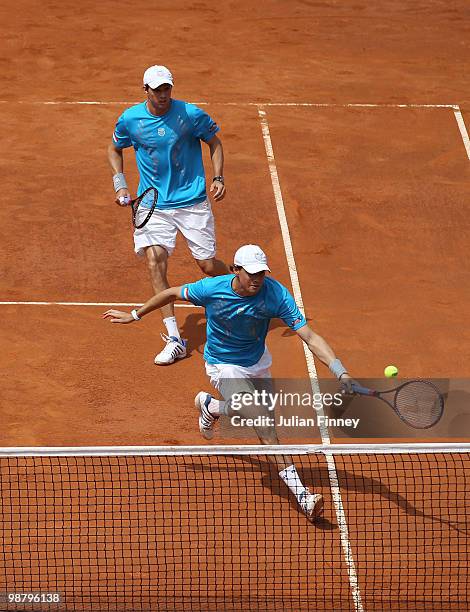 Bob and Mike Bryan of USA in action against John Isner and Sam Querrey of USA in the doubles final during day eight of the ATP Masters Series - Rome...