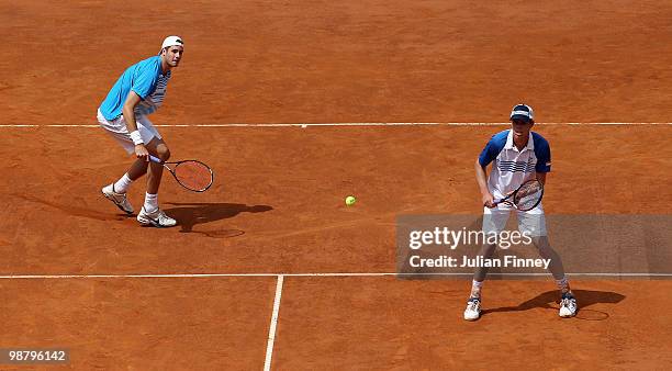 John Isner and Sam Querrey of USA in action against Bob and Mike Bryan of USA in the doubles final during day eight of the ATP Masters Series - Rome...