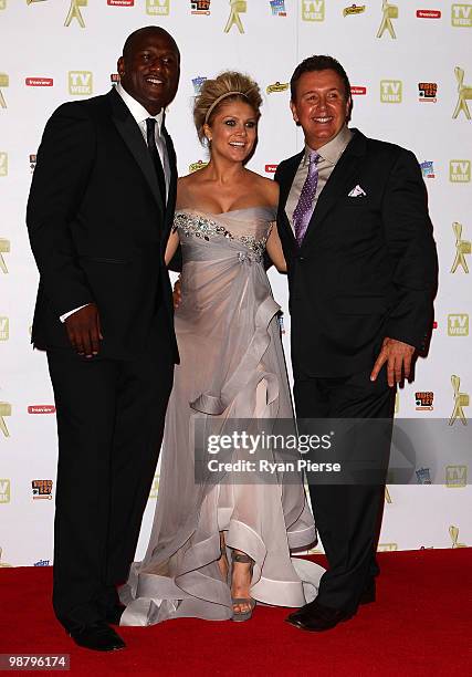 Singer and TV host Natalie Bassingthwaighte, former NRL player Wendell Sailor, and Peter Everitt arrive at the 52nd TV Week Logie Awards at Crown...