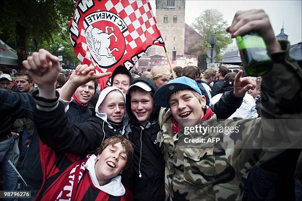 Supporters of Dutch Football team FC Twente watch the game between FC Twente and NAC Breda on giant screens in Enschede the match between FC Twente...