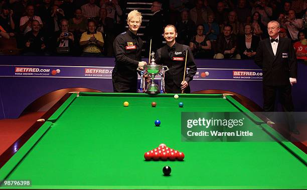 Neil Robertson of Australia and Graeme Dott of Scotland pose with the trophy befdor the final of the Betfred.com World Snooker Championships at The...