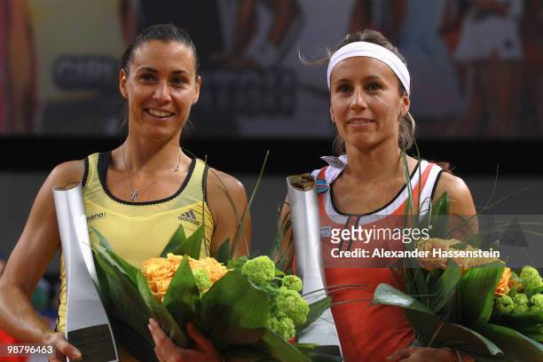 Flavia Pennetta of Italy celebrates with her team mate Gisela Dulko of Argentina winning the doubles final match against Kveta Peschke of Czech...