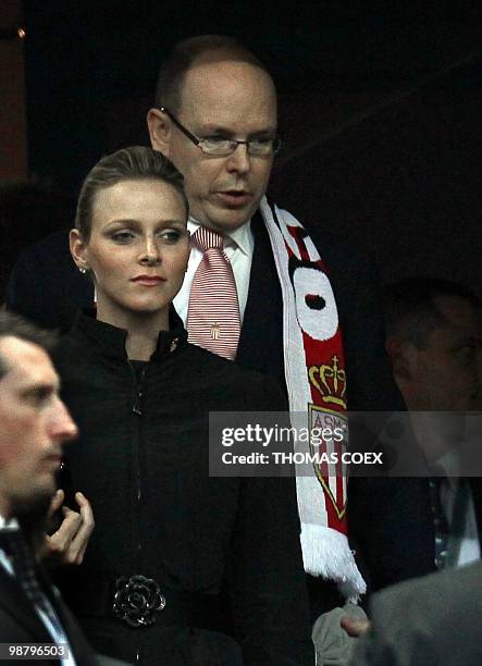 Prince Albert of Monaco and his girlfriend Charlene Wittsock arrive to attend the French football Cup final Paris Saint-Germain vs Monaco on May 1,...
