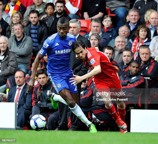 Yossi Benayoun of Liverpool competes with Salomon Kalou of Chelsea during the Barclays Premier League match between Liverpool and Chelsea at Anfield...