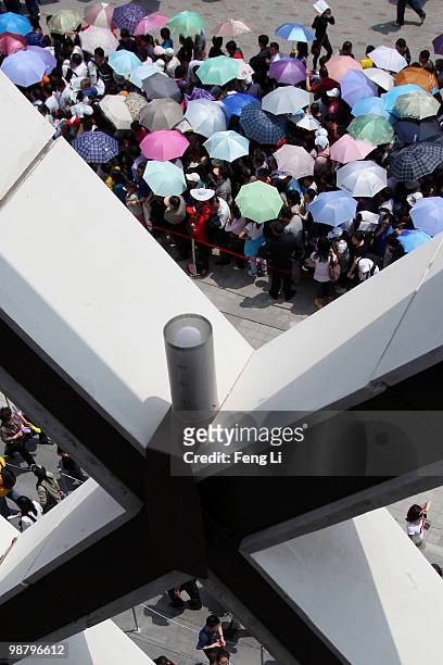 Visitors queue up to enter the France Pavilion on the second day of the Shanghai World Expo on May 2, 2010 in Shanghai, China. The expo, which runs...