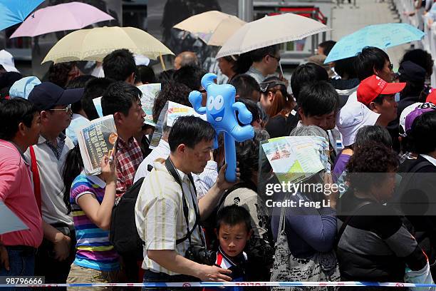 Visitors queue up to enter the France Pavilion on the second day of the Shanghai World Expo on May 2, 2010 in Shanghai, China. The expo, which runs...