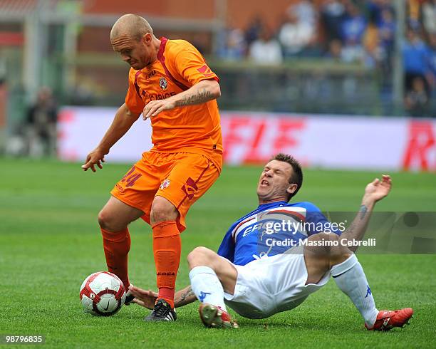 Antonio Cassano of UC Sampdoria battles for the ball against Mozart of AS Livorno Calcio during the Serie A match between UC Sampdoria and AS Livorno...