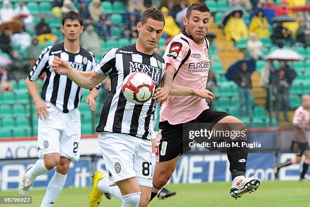 Aleandro Rosi of Siena and Antonio Nocerino of Palermo compete for the ball during the Serie A match between Siena and Palermo at Stadio Artemio...