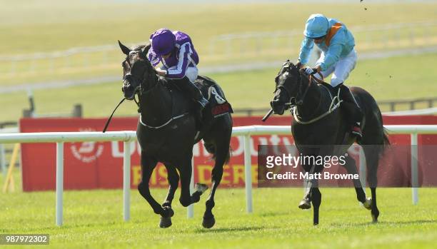 Kildare , Ireland - 30 June 2018; Van Beethoven, with Ryan Moore up, on their way to winning the GAIN Railway Stakes from second place Marie's...