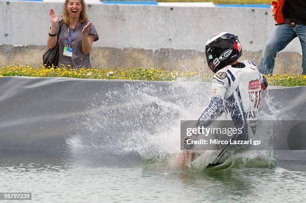 Jorge Lorenzo of Spain and Fiat Yamaha Team celebrates the victory and swimming on the lake at the end of the MotoGP race at Circuito de Jerez on May...