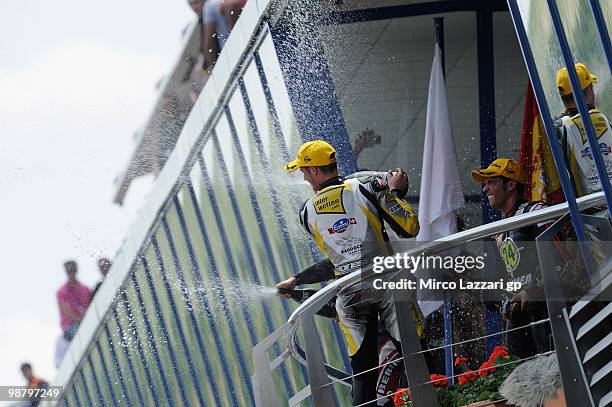 Shoya Tomizawa of Japan and Technomag - CIP and Thomas Luthi of Switzerland and Interwetten Moriwaki Racing and Toni Elias of Spain and Gresini...