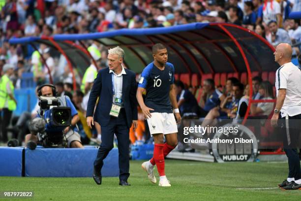 Kylian Mbappe and head coach Didier Deschamps of France during the FIFA World Cup Round of 16 match between France and Argentina at Kazan Arena on...