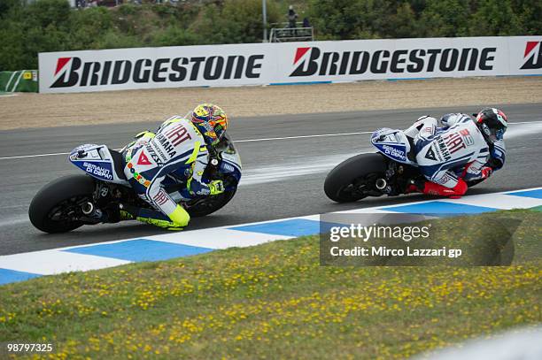 Jorge Lorenzo of Spain and Fiat Yamaha Team leads Valentino Rossi of Italy and Fiat Yamaha Team during the duel during the MotoGP race at Circuito de...