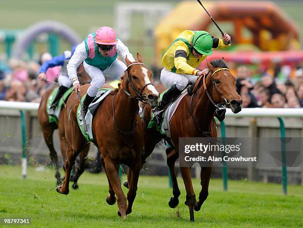 Special Duty and Stephane Pasquier win The Stanjames.com 1000 Guineas from Jacqueline Quest and Tom Queally who passed the winning post first but was...