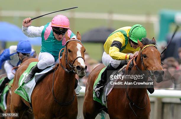 Special Duty and Stephane Pasquier win The Stanjames.com 1000 Guineas from Jacqueline Quest and Tom Queally at Newmarket racecourse on May 02, 2010...
