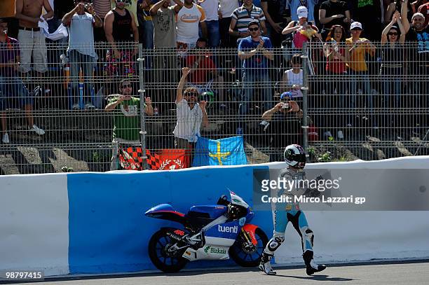 Pol Espargaro of Spain and Tuenti Racing parks the bike in order to celebrate the victory in front of his fans at the end of the 125 cc race at...
