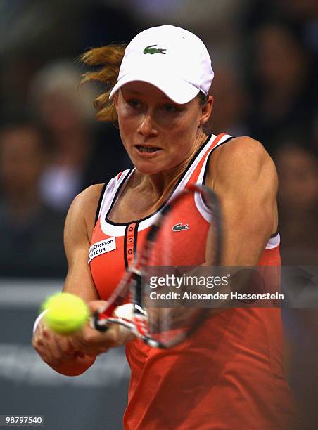 Samantha Stosur of Australia plays a back hand during her final match against Justin Henin of Belgium at the final day of the WTA Porsche Tennis...