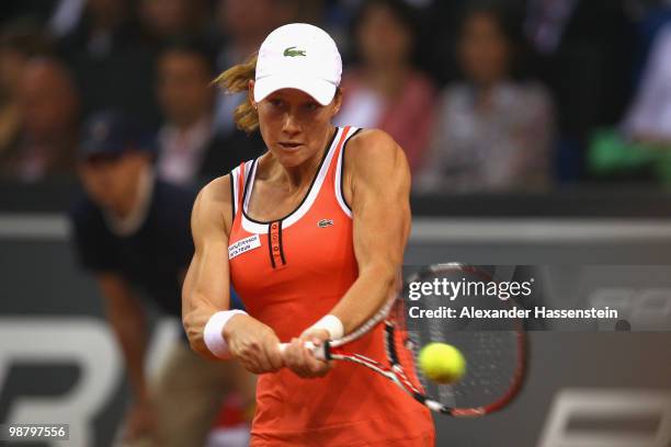 Samantha Stosur of Australia plays a back hand during her final match against Justin Henin of Belgium at the final day of the WTA Porsche Tennis...