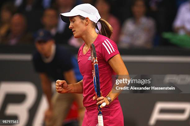 Justin Henin of Belgium reacts during her final match against Samantha Stosur of Australia at the final day of the WTA Porsche Tennis Grand Prix...
