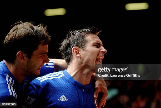 Frank Lampard of Chelsea celebrates with teammate Branislav Ivanovic after scoring his team's second goal during the Barclays Premier League match...