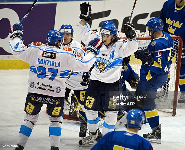 Finland's team players celebrates after Juhamatti Aaltonen scored a goal and equalized 2-2 during the Sweden vs. Finland match in the LG Hockey Games...