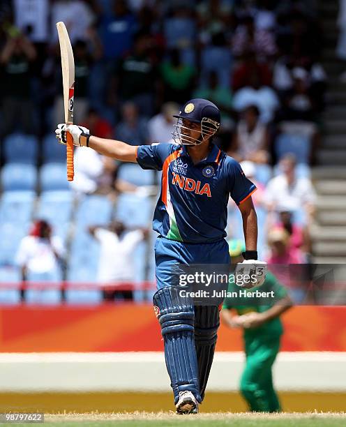 Suresh Raina of India celebrates his century durring The ICC World Twenty20 Group C match between South Africa and India played at The Beausejour...