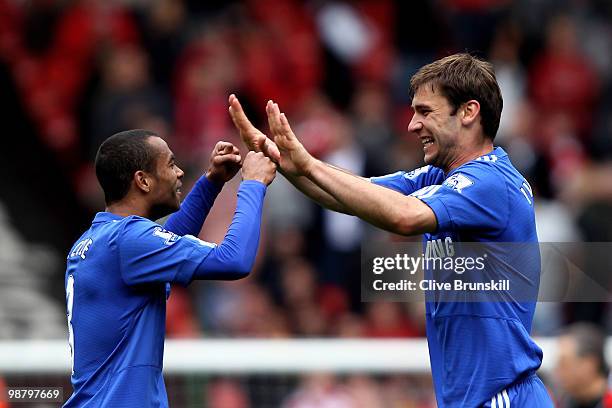 Ashley Cole and Branislav Ivanovic of Chelsea celebrate following their team's 2-0 victory during the Barclays Premier League match between Liverpool...