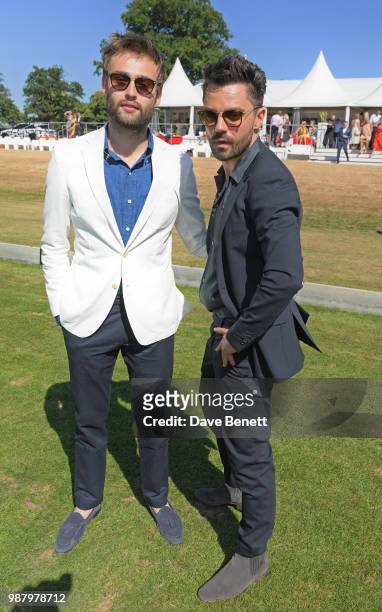 Douglas Booth and Dominic Cooper attend the Audi Polo Challenge at Coworth Park Polo Club on June 30, 2018 in Ascot, England.