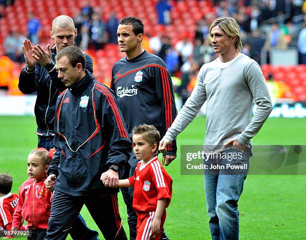 Fernando Torres walks round the pitch at the end the Barclays Premier League match between Liverpool and Chelsea at Anfield on May 2, 2010 in...