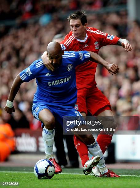 Nicolas Anelka of Chelsea is challenged by Daniel Agger of Liverpool during the Barclays Premier League match between Liverpool and Chelsea at...