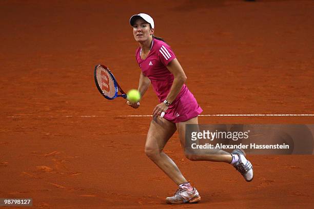 Justine Henin of Belgium plays a fore hand during her final match against Samantha Stosur of Australia at the final day of the WTA Porsche Tennis...