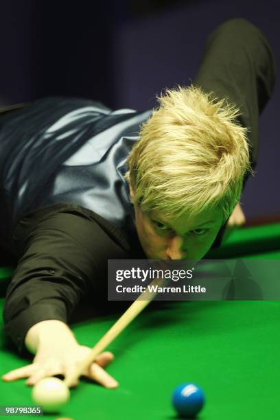 Neil Robertson of Australia in action against Graeme Dott of Scotland during the final of the Betfred.com World Snooker Championships at The Crucible...