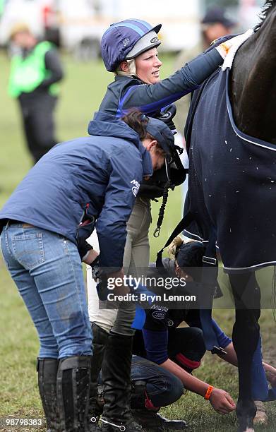 Zara Phillips of Great Britain takes care of her horse Glenbuck after competing in the Cross Country Test on day three of the Badminton Horse Trials...