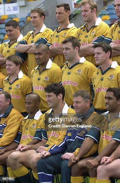 Australian Wallabies players line up for a team photo before a training session at the Gabba in Brisbane, Australia. The Wallabies are playing the...