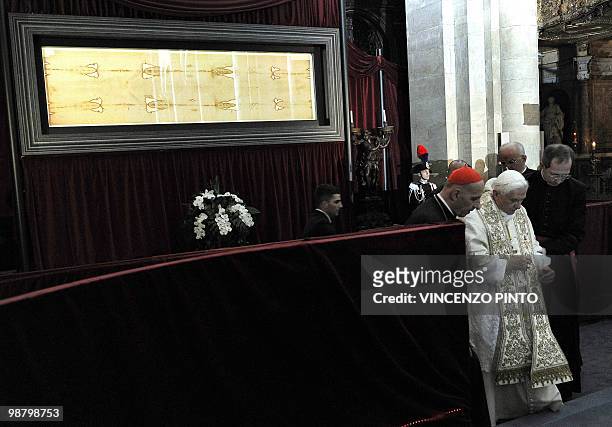 Pope Benedict XVI arrives to pray in front of the Shroud in the Turin cathedral on May 2, 2010. Pope Benedict XVI will bow before the Shroud of...