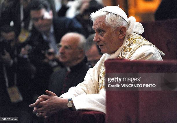 Pope Benedict XVI prays in front of the Shroud in the Turin cathedral on May 2, 2010. Pope Benedict XVI will bow before the Shroud of Turin, the...