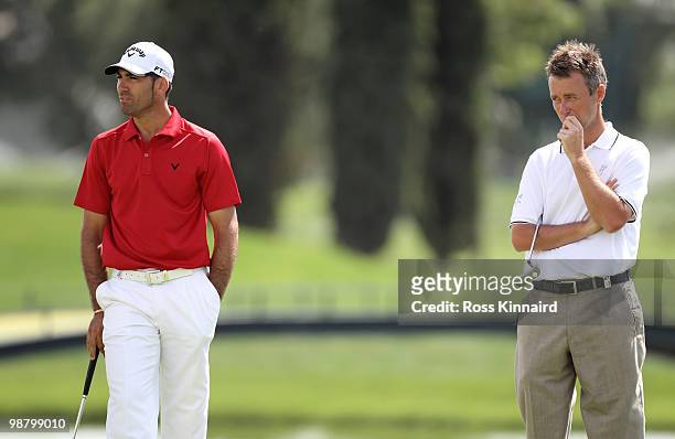 Alvaro Quiros of Spain and Mark Foster of England during the final round of the Open de Espana at the Real Club de Golf de Seville on May 2, 2010 in...
