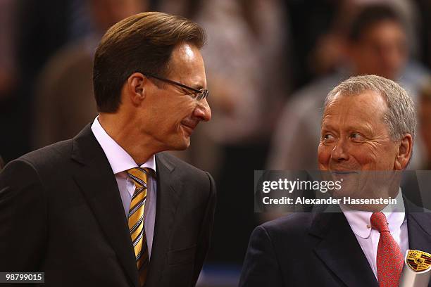 Michael Macht , chief executive officer of Porsche AG, talks to Wolfgang Porsche, chairman of the supervisor board Porsche AG at the final day of the...