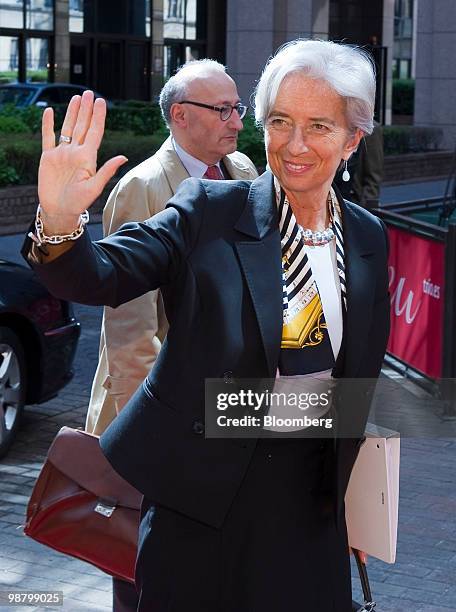 Christine Lagarde, France's finance minister, center, arrives for the extraordinary meeting of European Union finance ministers in Brussels, Belgium,...
