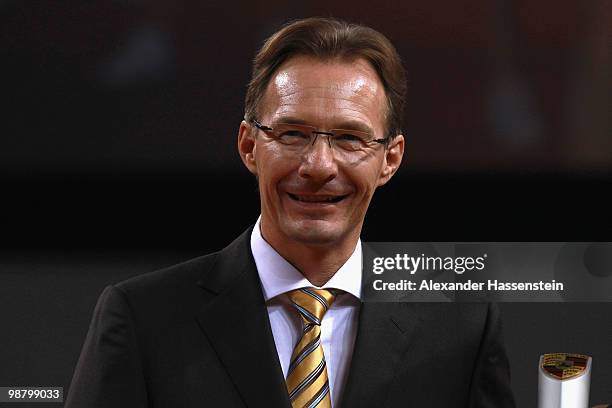 Michael Macht, chief executive officer of Porsche AG, looks on at the final day of the WTA Porsche Tennis Grand Prix Tournament at the Porsche Arena...