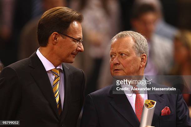 Michael Macht , chief executive officer of Porsche AG, talks to Wolfgang Porsche, chairman of the supervisor board Porsche AG at the final day of the...